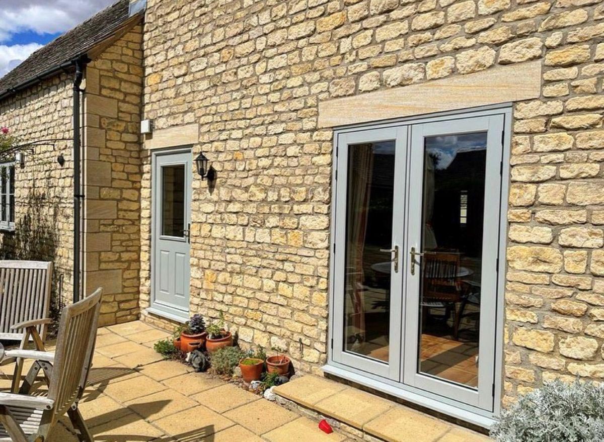 Grey residence french door installation