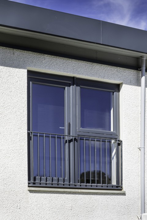 Grey tilt and turn window