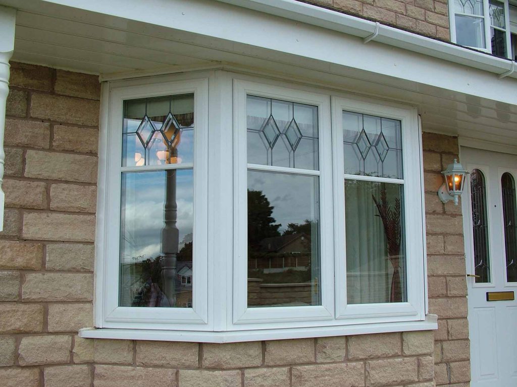 Traditional white uPVC bay window