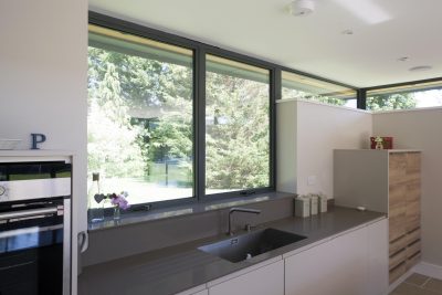 Large grey aluminium windows